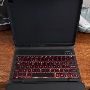Black I-pad Keyboard  and Case with backlighting with box  (used once or twice)